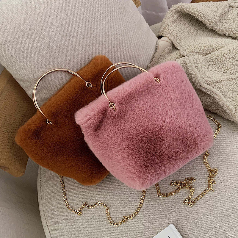 Plush straddle shoulder bag with gold chain strap, brown and pink furry exterior