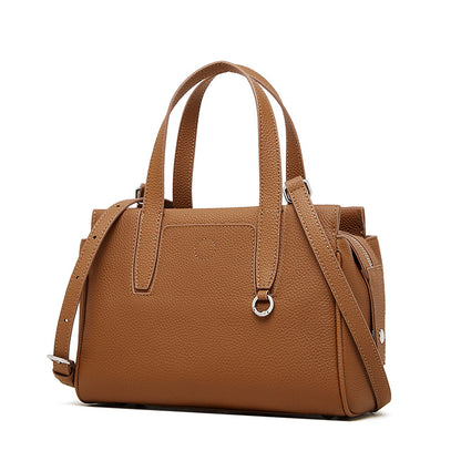 Brown crossbody bag with top handles, adjustable shoulder strap, and front pocket