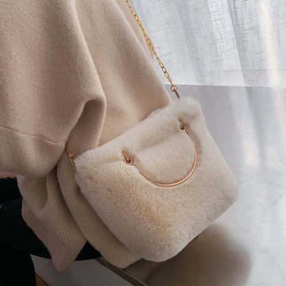 Plush shoulder bag with gold chain strap and round copper handle, white