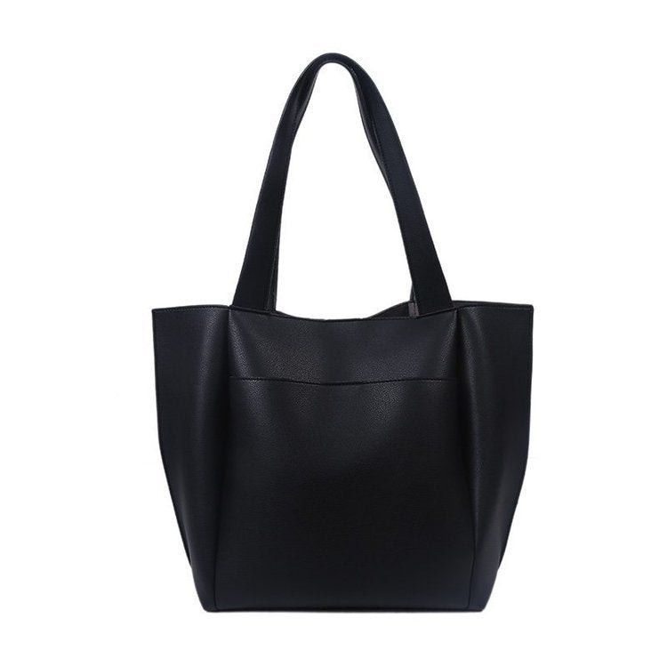 Black large-capacity tote handbag with two top handles and wide rectangular shape