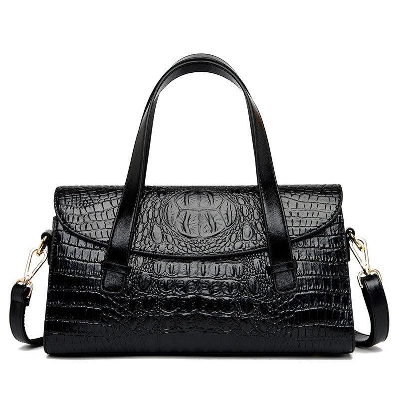 Black croc-pattern hand carry shoulder bag with top handles and adjustable shoulder straps