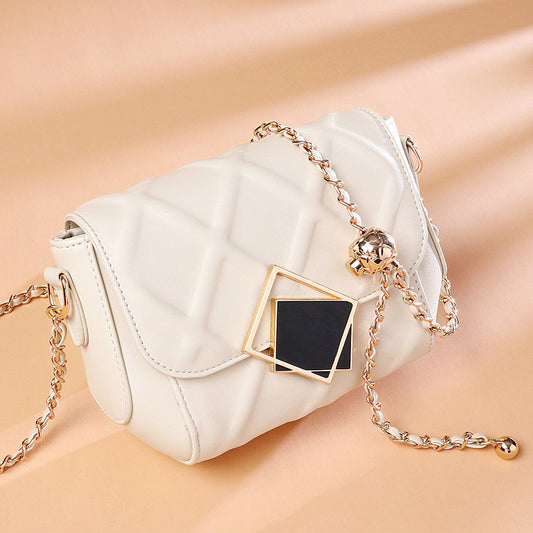White quilted leather shoulder crossbody bag with chain strap and square front clasp